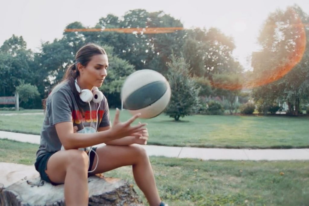 Jan Kamar as Eliza holding a basketball in "Fastbreak"