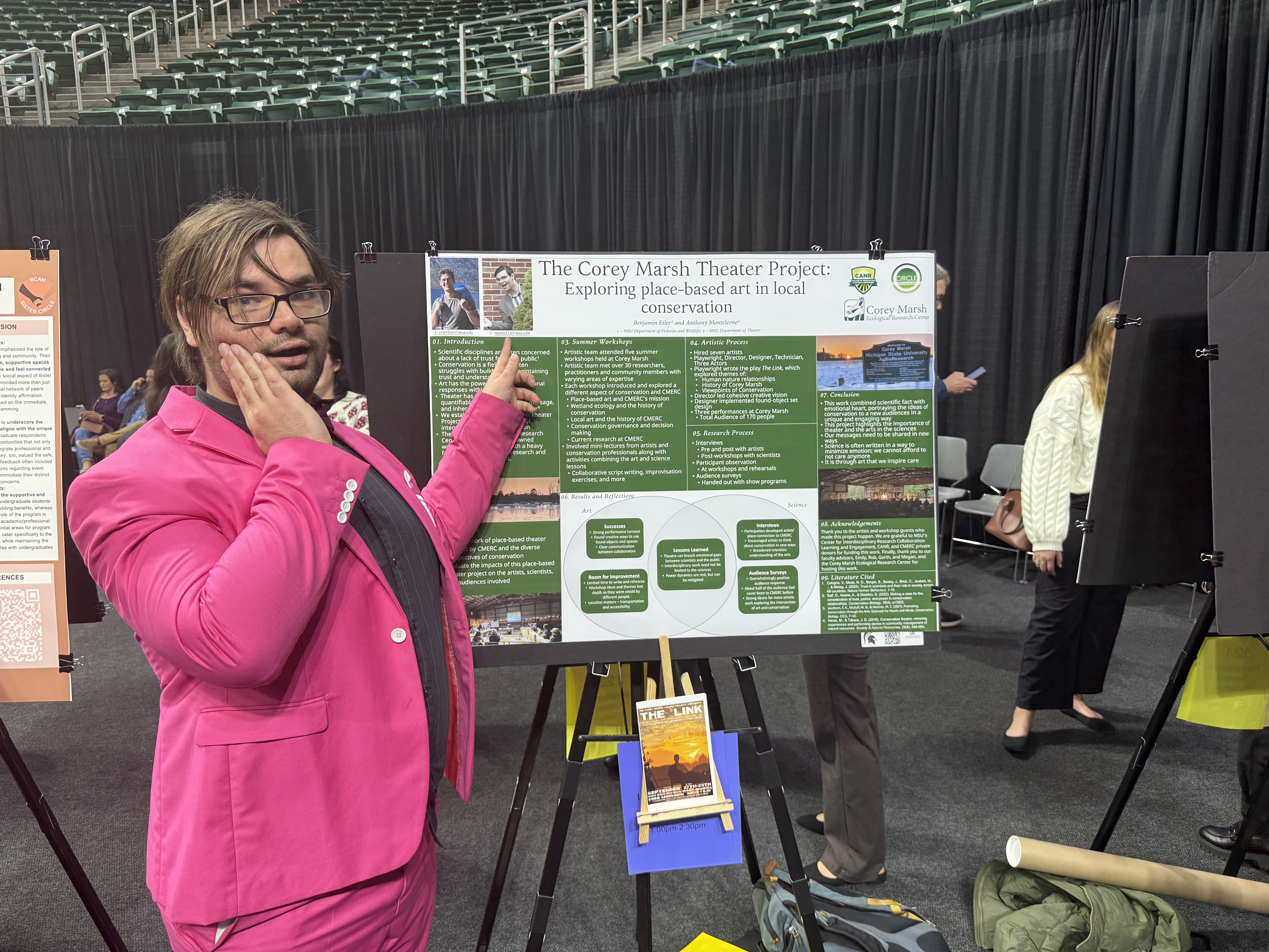 Anthony Monteleone posing with his research at UURAF at Michigan State University