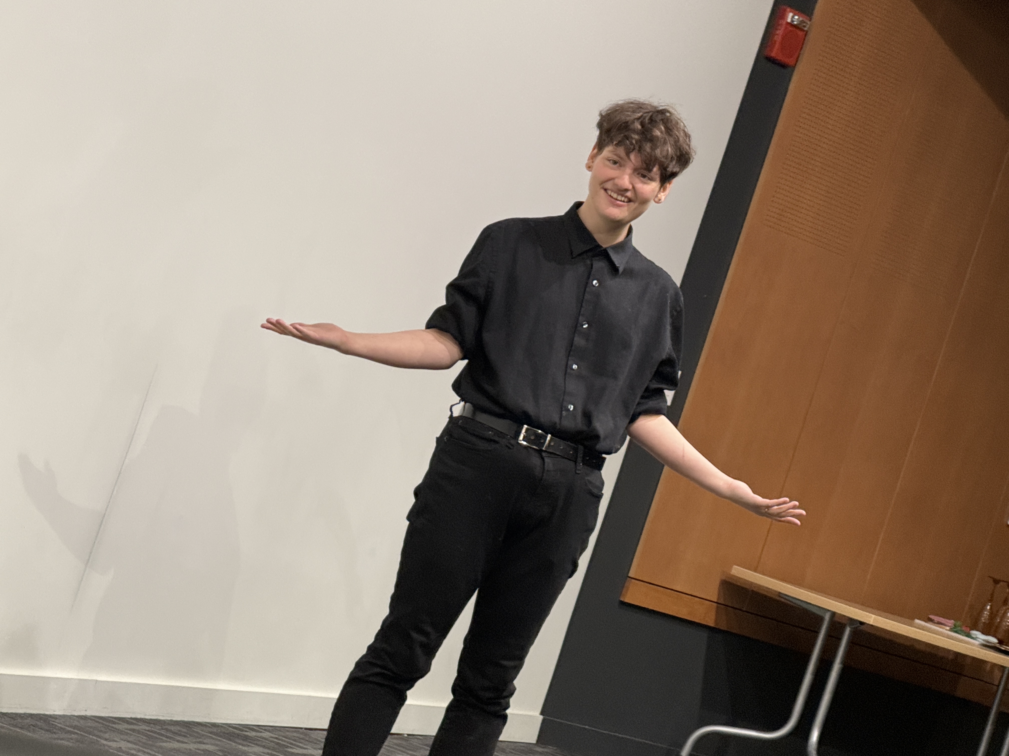 Tobias Sanders stands awkwardly during Second Stage Playwriting at the Facility For Rare Isotope Beams (FRIB)