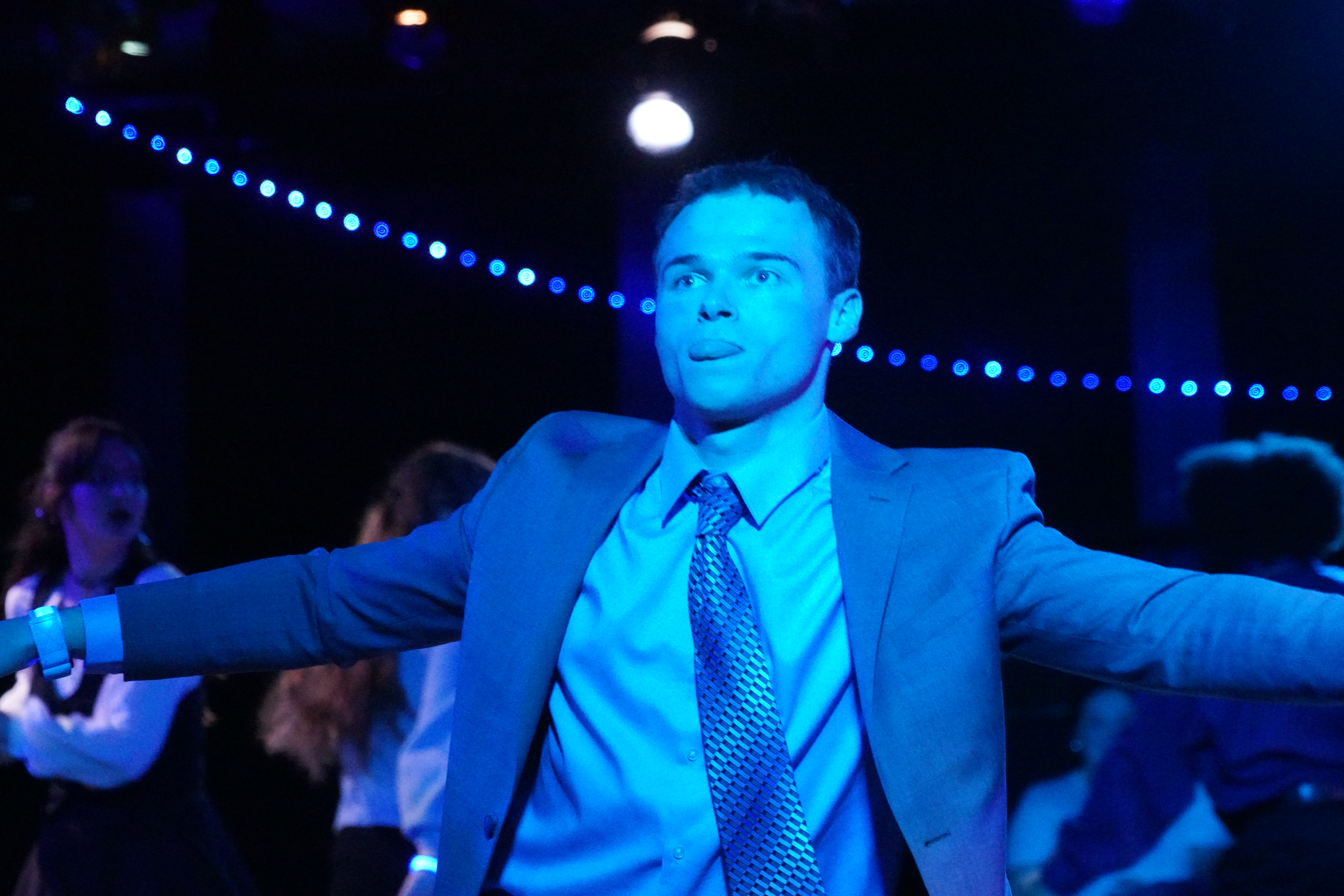 Logan Verlinde as Mr. Davidson sticking out his tongue in Second Stage Productions "The Guy Who Didn't Like Musicals"