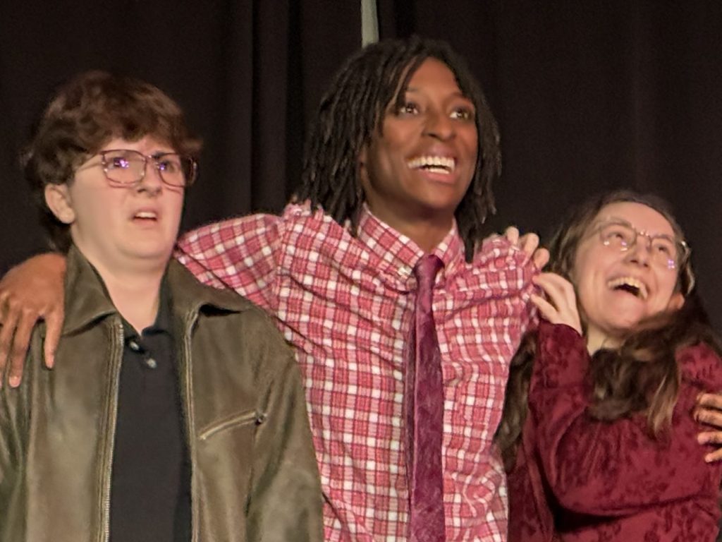 Maggz Day as Clipperta looking uncomfortable, Milo Jones as Jimmy Cider looking cheery, and Kayla Michelle Hutto as Sniv looking cheery in "Oh God, Please Let Me In!" by Bryan Karpinski and directed by Anthony Monteleone 